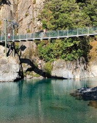 Jumping through sandflies into the blue pools