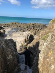 Clambering over the rocks to the next section of Ocean Beach